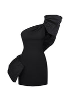 Nué Rowen mini dress shown on a hanger, featuring a stylish, fitted design with a soft fabric and modern silhouette.