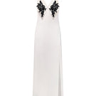 White Nué Perla Maxi Dress with flowing fabric and elegant design, perfect for summer or special occasions.