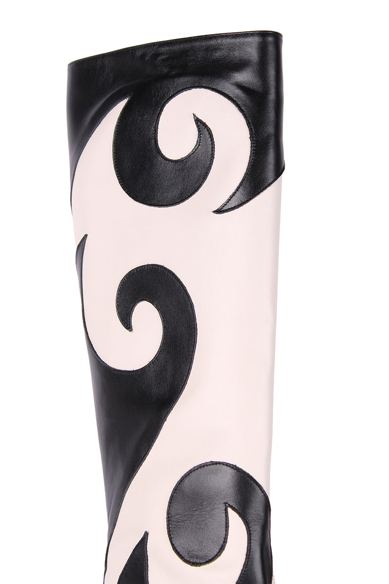 Terry de Havilland Val Waves Boots showing stylish black leather ankle boots with wave detailing and pointed toes.