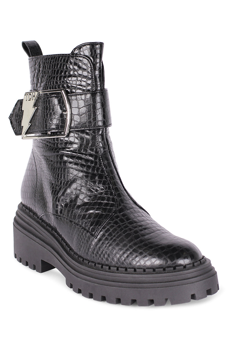 Black Festival Boots by Terry de Havilland featuring sleek leather design and stylish ankle-high silhouette.