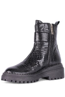 Black Festival boots by Terry de Havilland with pointed toes and chunky heels, displayed on a neutral background.