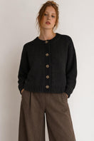 First Born Knits Frenchie Ete cardigan, lightweight knit sweater with colorful striped pattern and button front detail.