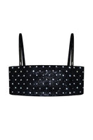 Black polka-dot Charlotte top by Nué, stylish sleeveless blouse with a modern fit, perfect for casual or dressy occasions.