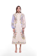 BY HAÓ Floréa midi dress in Jardin print, featuring floral pattern, flowing fabric, and elegant knee-length design.