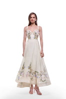 BY HAÓ Fleuria asymmetric bustier maxi dress in Jardin with floral pattern and elegant design, shown on a dress form.