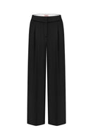 Nué MARTINE black pants, stylish and comfortable, shown in a close-up image highlighting the fabric and fit.