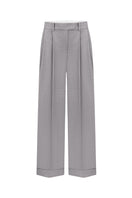 Nué Bowie trousers, stylish pants with a modern fit, shown in the image with a sleek design and versatile look.