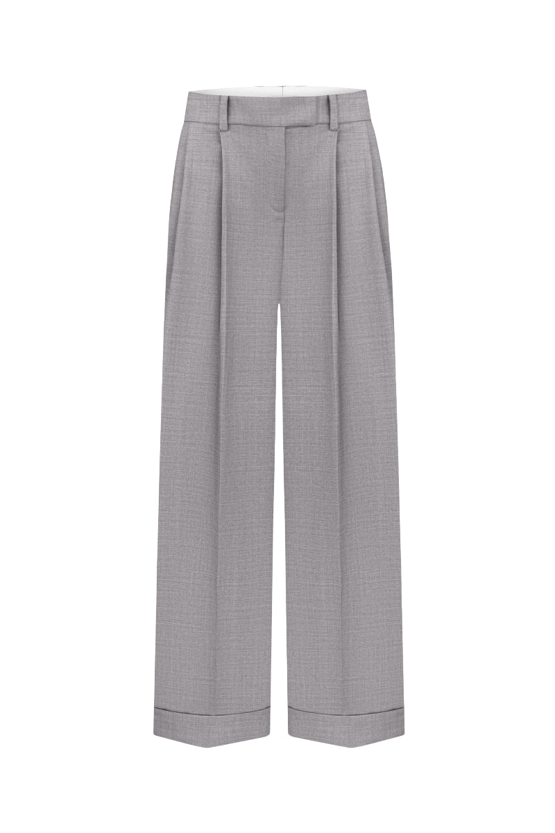 Nué Bowie trousers, stylish pants with a modern fit, shown in the image with a sleek design and versatile look.
