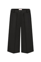 Black Sayya bermud shorts, casual men's shorts with a comfortable fit, shown on a model in a relaxed outdoor setting.