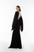 Lili Blanc black gown with elegant, flowing fabric and fitted bodice, perfect for formal occasions.