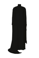 Black Studio NK infinity dress in a flowing maxi style, showcased on a model with soft fabric and elegant design.