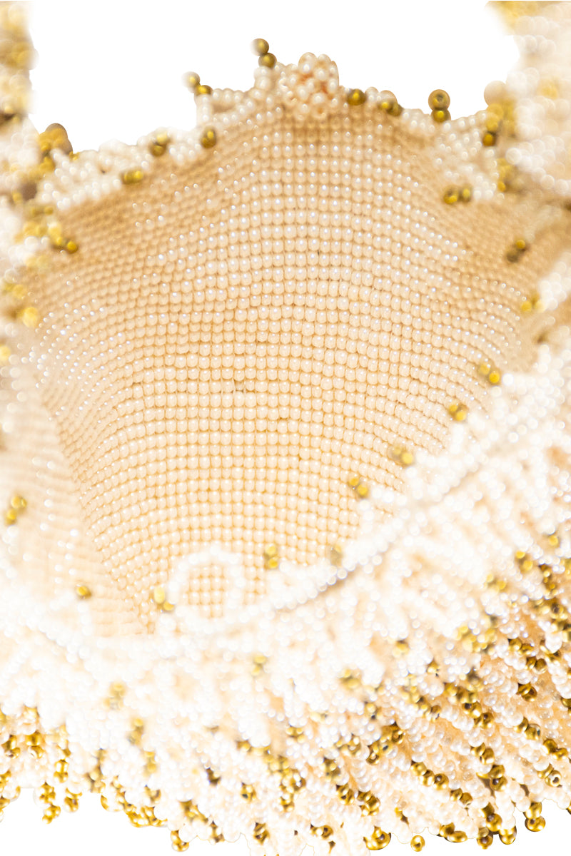 Interior view of the Sac de Soul Nina Bag in cream and gold top handle style, showcasing its elegant design and spacious interior.
