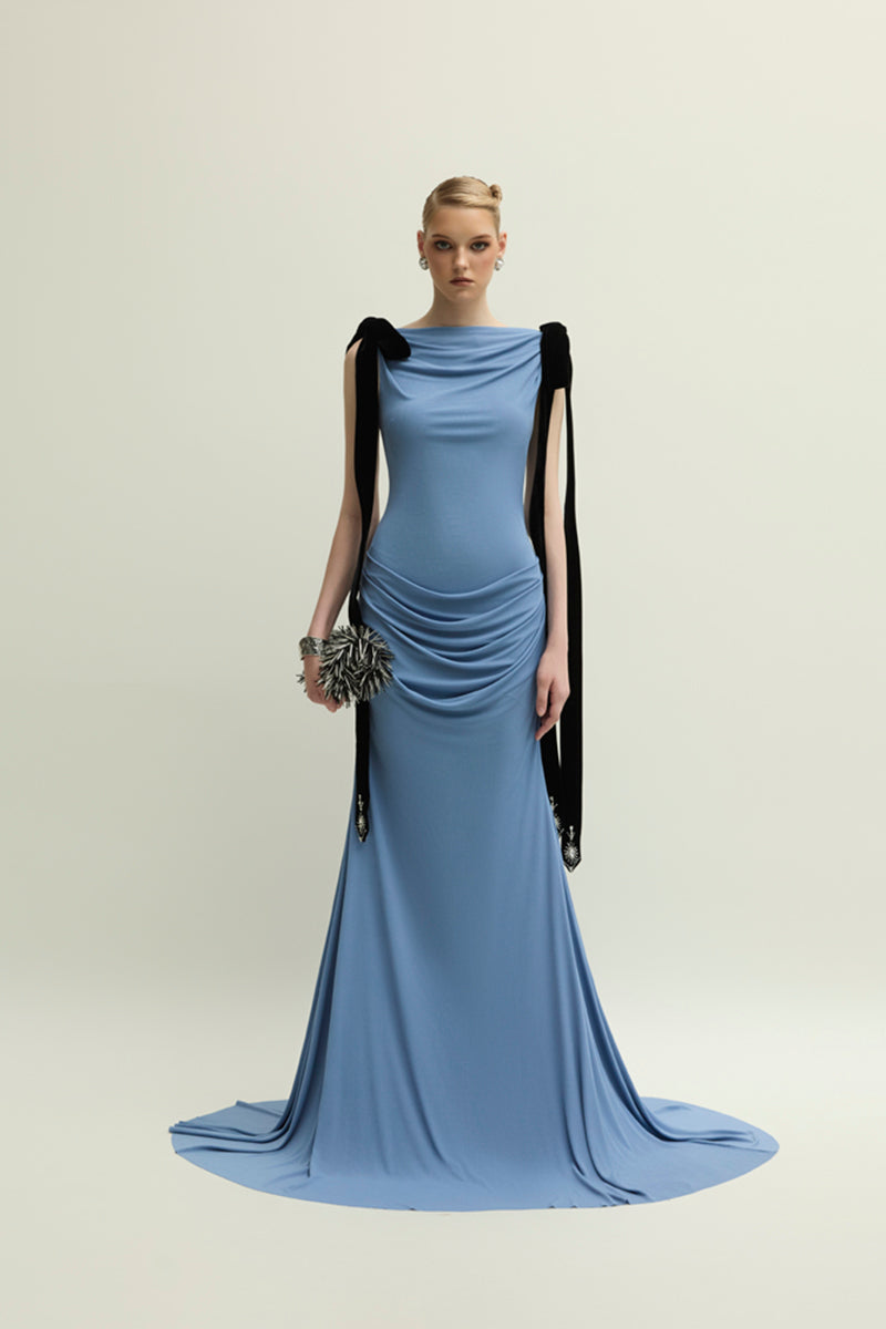 Blue Islington gown by Jenny K Tran featuring elegant fabric and a flowing silhouette, perfect for formal occasions.