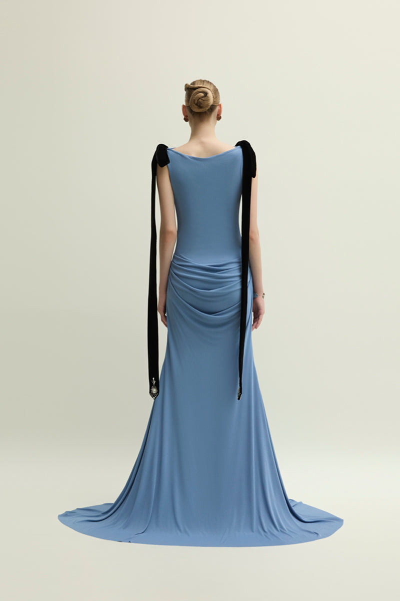 Jenny K Tran Islington Blue gown with elegant flowing fabric and a stylish design, perfect for formal occasions.