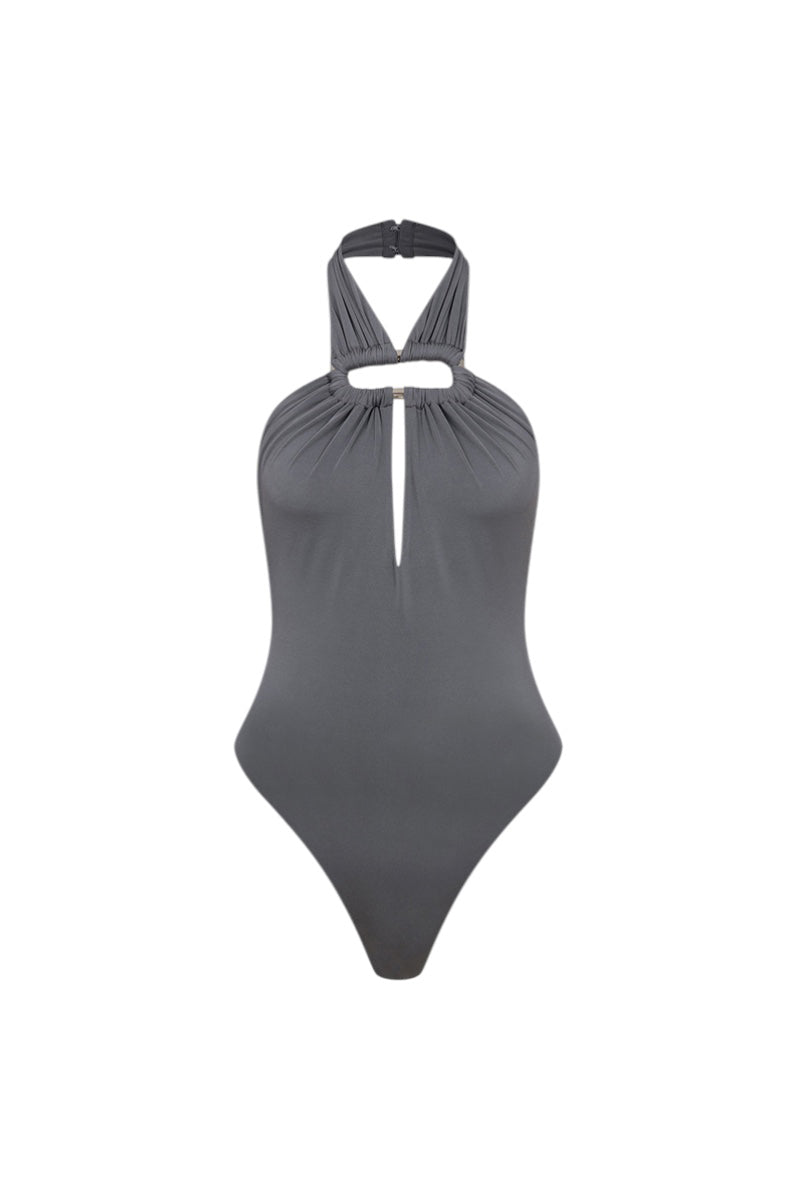 Gray ILA LEYA bodysuit, a stylish women's top with long sleeves and a fitted design, displayed on a mannequin.