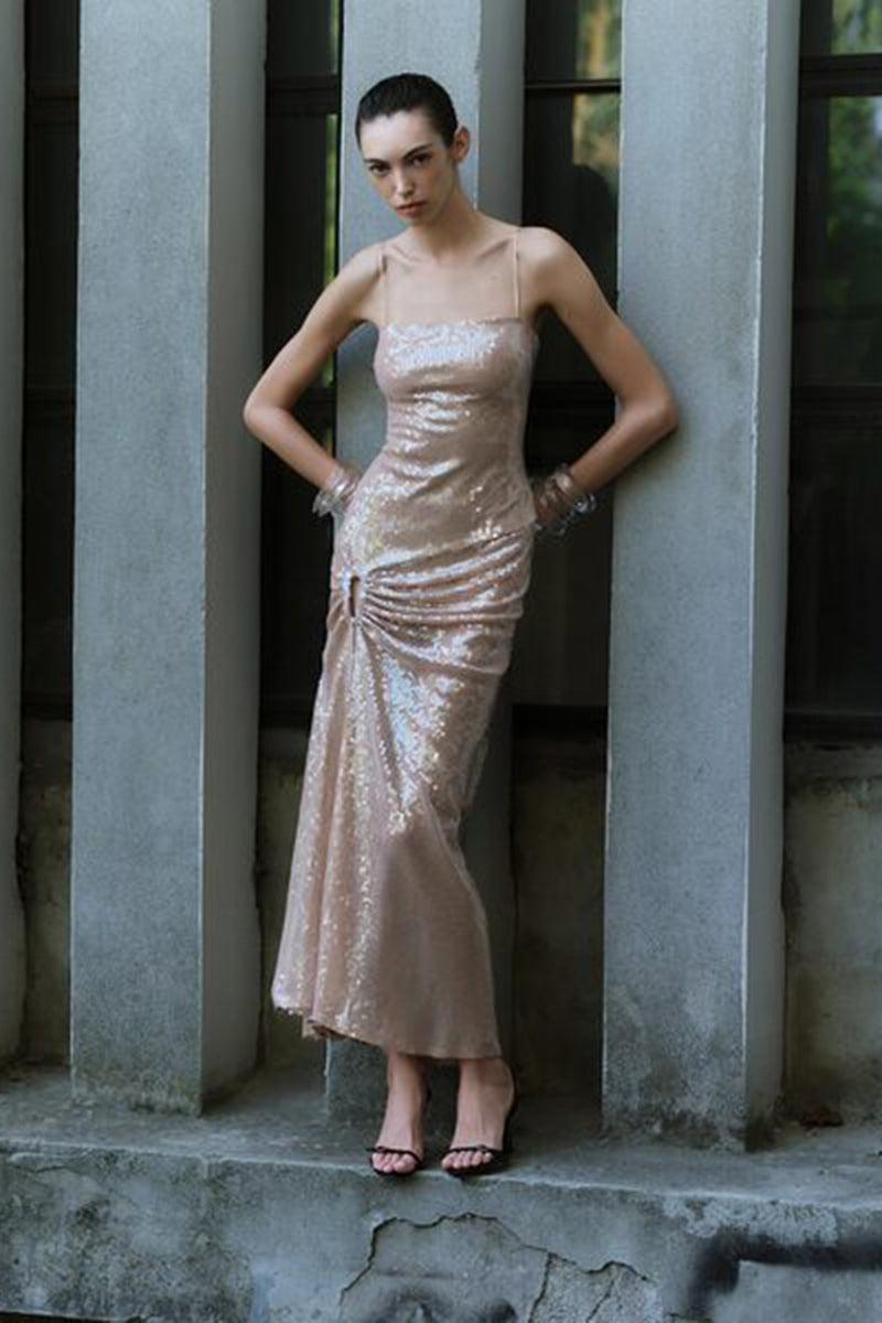Nude sequined midi dress by ILA featuring a fitted silhouette and elegant design, suitable for evening or special occasions.