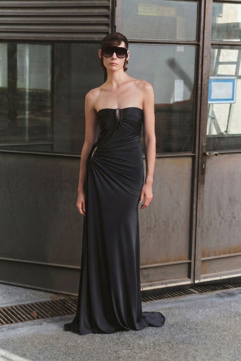 Black ILA Clara maxi dress with a flowing silhouette and elegant design, perfect for stylish occasions.
