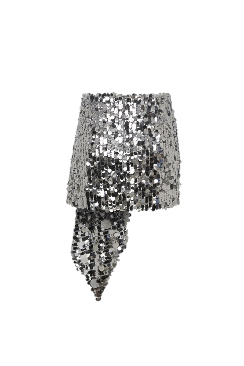 Back view of ILA Leslie Silver Sequin Mini Skirt, showcasing shiny silver sequins and fitted waist for a stylish look.