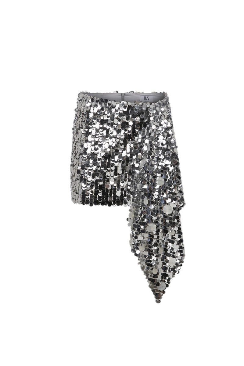 Silver sequin mini skirt by ILA, front view showing shiny embellishments and fitted waist, perfect for festive or night-out looks.