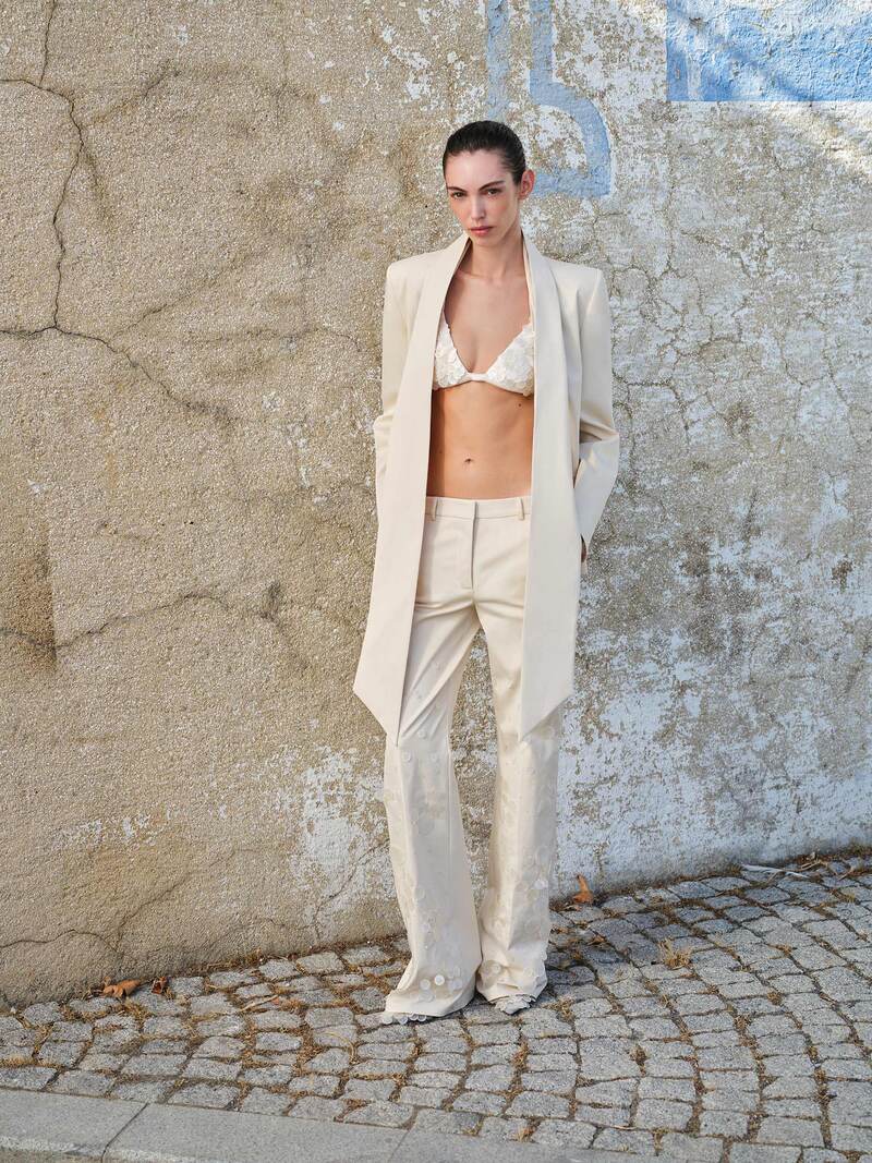 Ilá Sienna bra top in seashell ecru, soft fabric with delicate design, shown on a plain background.