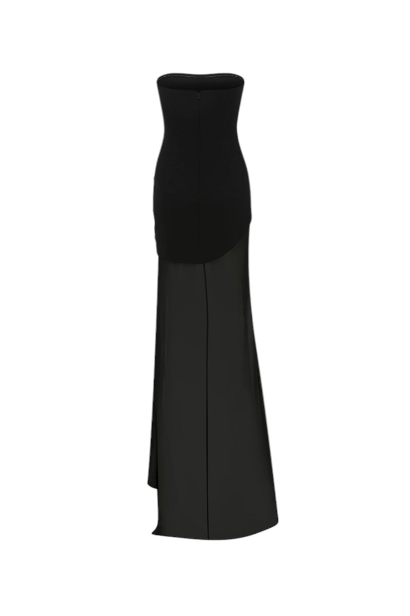 Back view of ILA Ashley black maxi dress, flowing fabric, long sleeves, and elegant design perfect for stylish occasions.