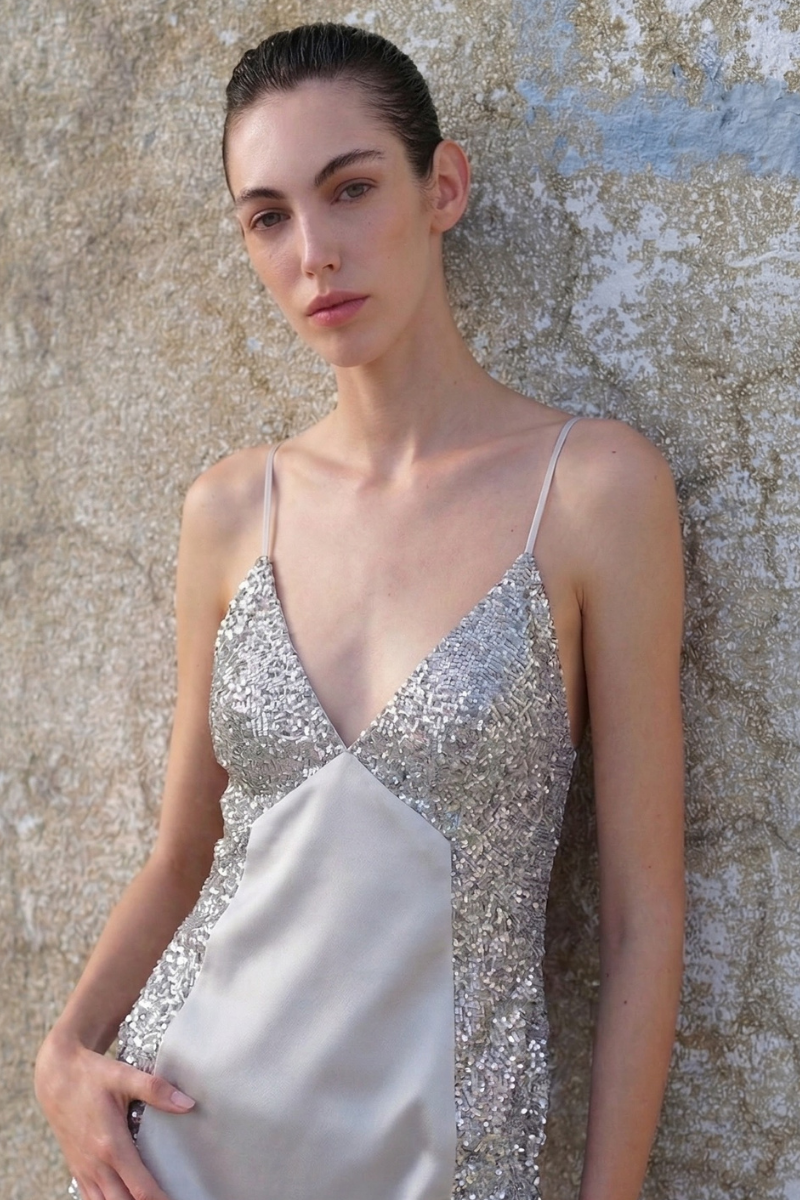 Silver sequin Lena top by ILA, featuring shiny sequined fabric and a stylish sleeveless design perfect for evening wear.