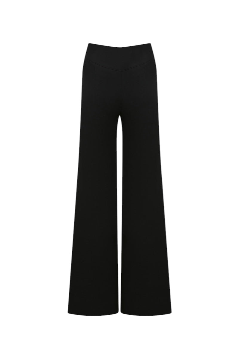 Back view of ILA ROXY black pants showing relaxed fit and stylish design, perfect for casual or streetwear looks.