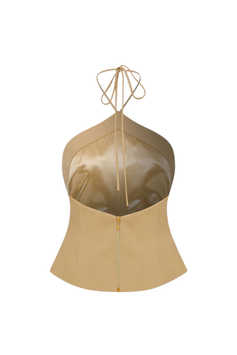 Back view of beige ILA LEONI top, a stylish women’s blouse with a relaxed fit and subtle design details.