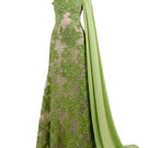 Green Idalia Gown by Rayane Bacha featuring flowing fabric and elegant design, perfect for formal occasions.