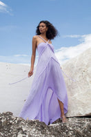 Kasia Kulenty ILYA maxi dress in lilac fabric, flowing design, with long sleeves and elegant silhouette.