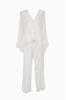 White Ellipse Lingerie pajama pant set with relaxed fit, featuring soft fabric and comfortable elastic waistband.