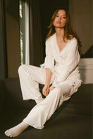Ellipse Lingerie white pajama pant set featuring comfortable, stylish pajama pants and top for relaxed sleepwear.