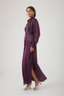 Elegant aubergine maxi dress by Mastani featuring intricate embellishments, flowing fabric, and stylish design perfect for special occasions.