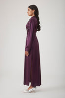 Elegant aubergine Indira embellished maxi dress by Mastani, featuring intricate embroidery and flowing fabric.