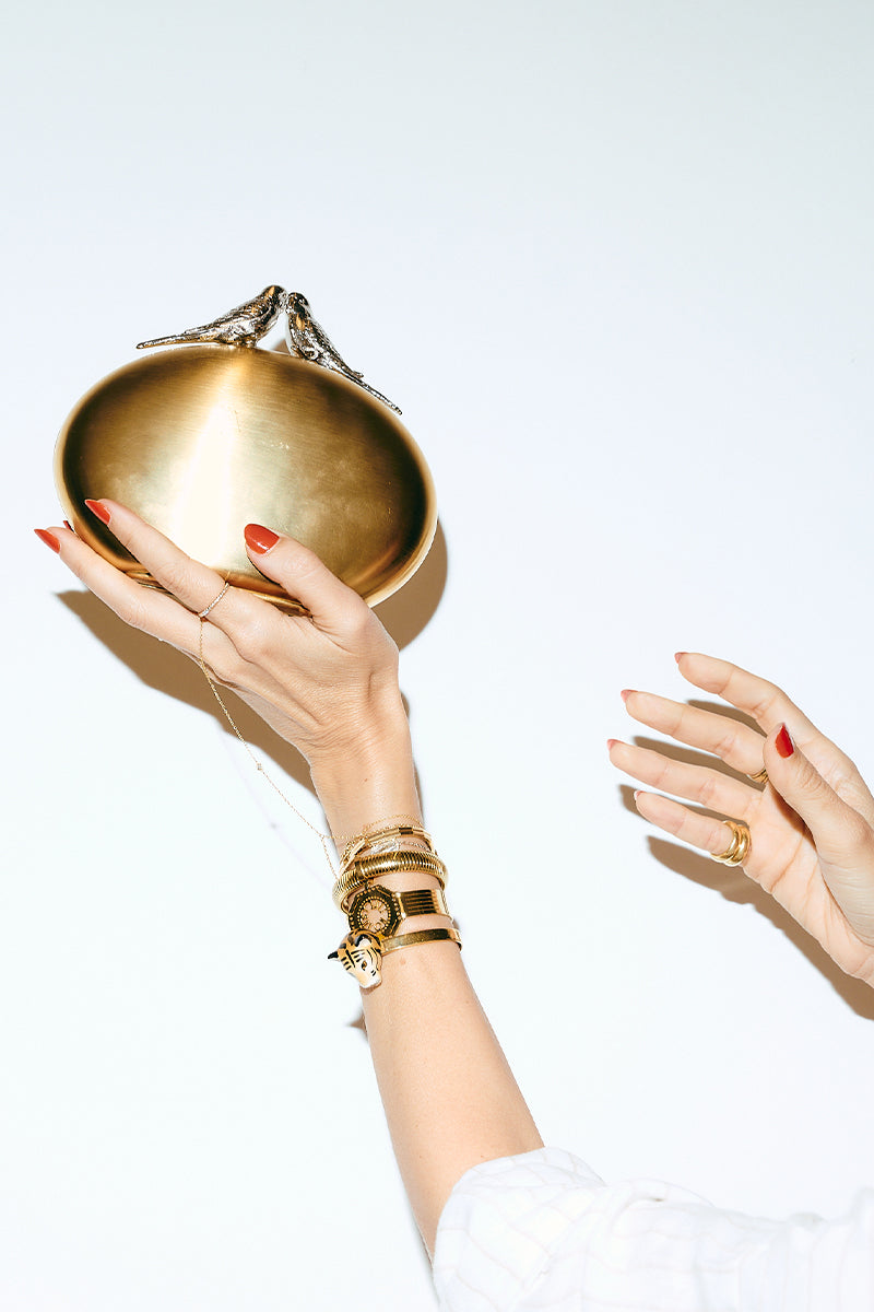 Gold Sarah's Bag inseparable birds clutch featuring a detailed design with two birds intertwined, perfect for stylish accessories.