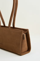 POELLE CECILIE top handle bag in caramel leather, featuring a sleek design and elegant carry handle.