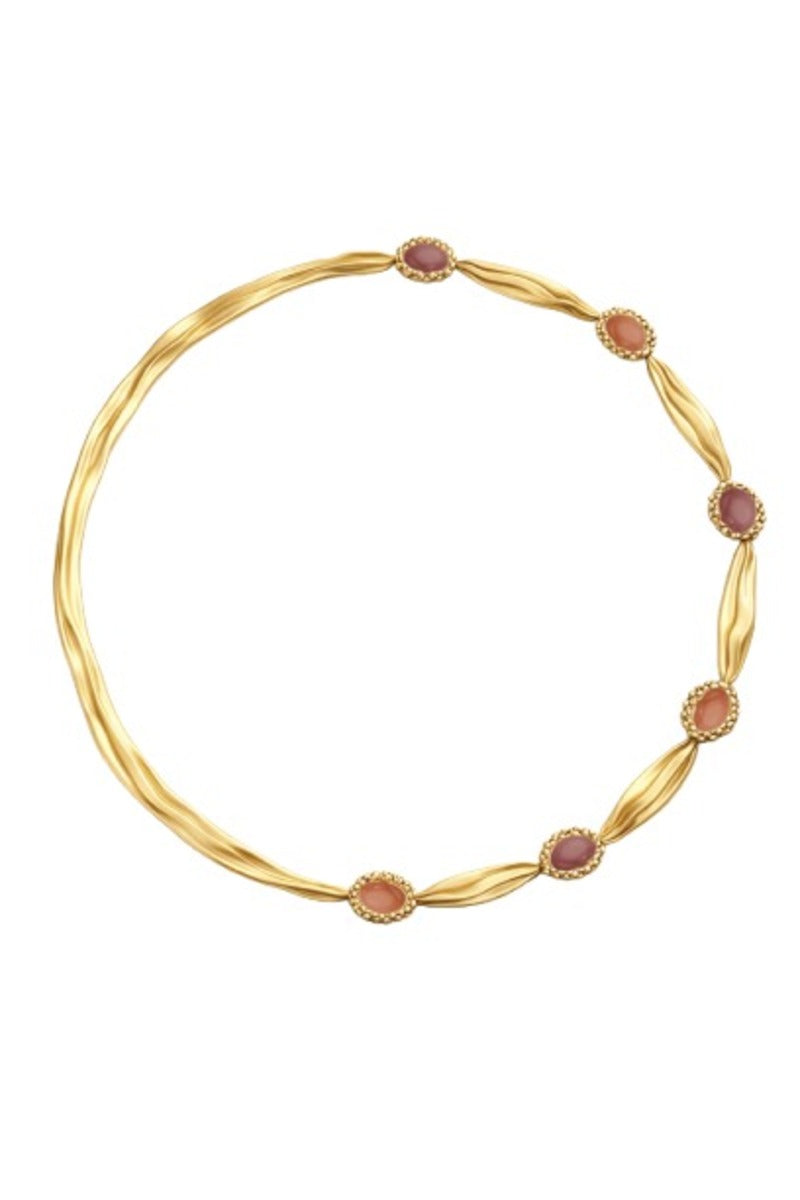 Gold and pearl interchangeable spiral necklace by Jude Benhalim with vibrant red accents, showcasing a stylish, modern jewelry design.