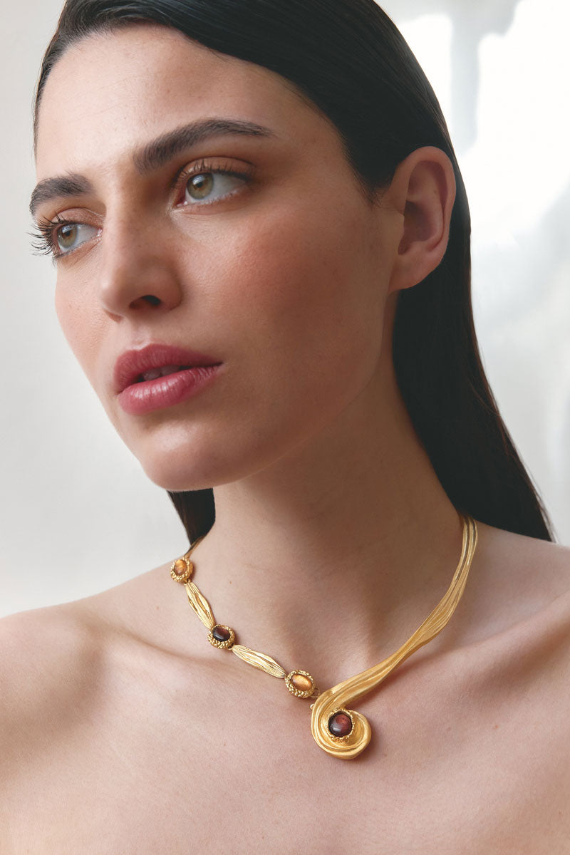 Gold and pearl interchangeable spiral necklace by Jude Benhalim featuring a stylish, modern design with a twist detail.