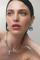 Silver and blue interchangeably styled hoop earrings by Jude Benhalim featuring spiral design and versatile dangle options.