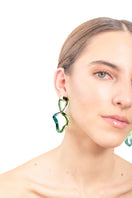 Salvarea Interconexión L green earrings with intricate design, showcasing vibrant green hues and stylish accessory details.