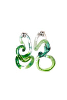 Salvára interconnection earrings in vibrant green with intricate design, showcasing elegant jewelry for women.