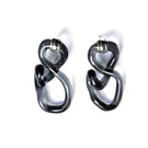 Salvárea Interconexión M earrings in smoky gray with sleek, modern design, featuring interconnected loop details.
