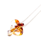 INTERCONEXION PENDANT IN AMBER