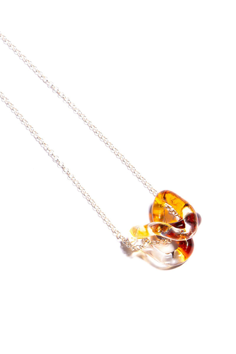 INTERCONEXION PENDANT IN AMBER