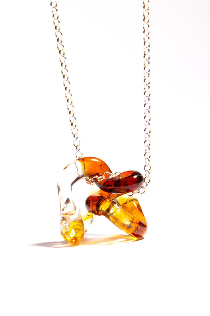 INTERCONEXION PENDANT IN AMBER