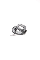 Set of SALVÁREA interconnection rings in smoky design, showcasing stylish layered rings on a neutral background.