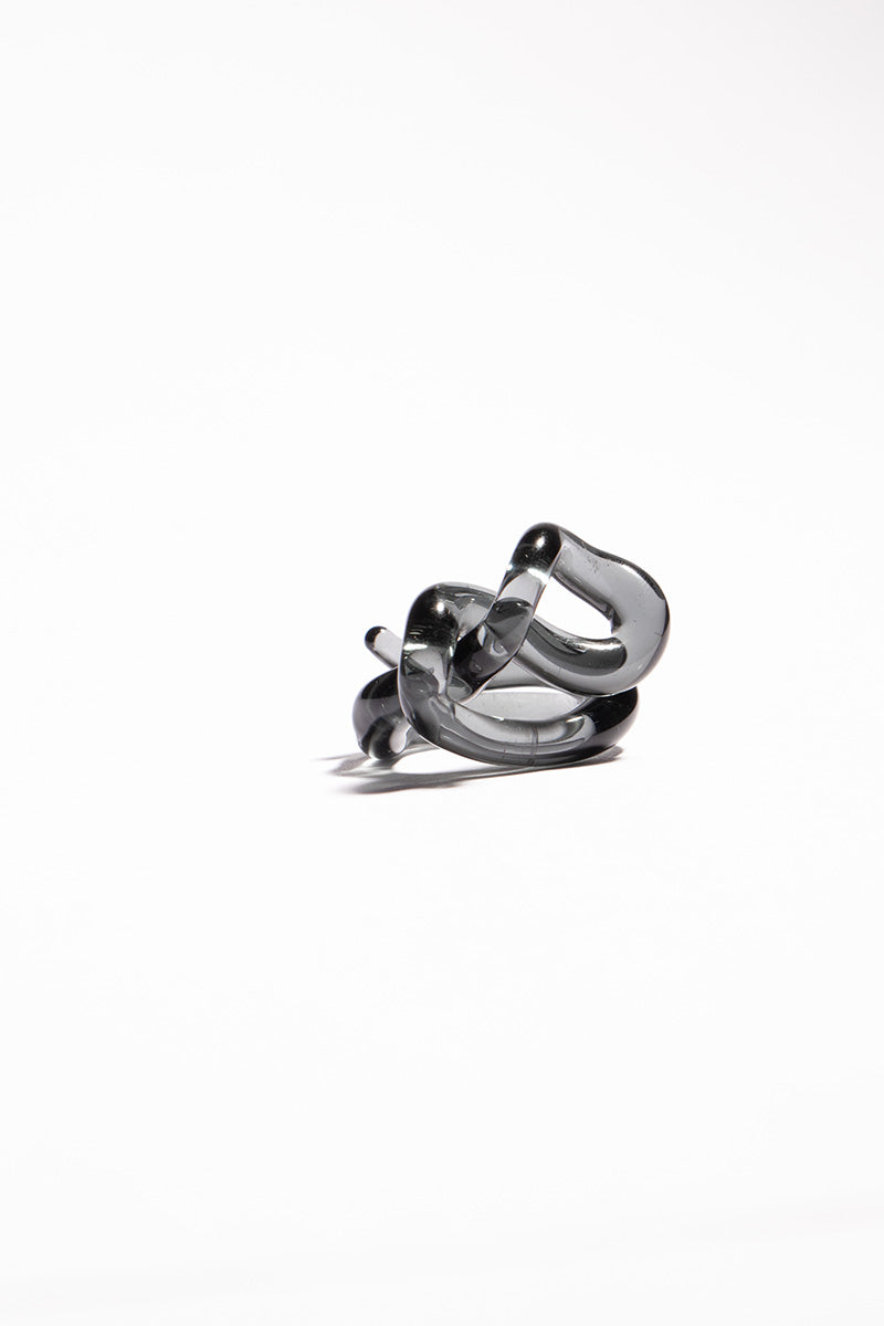 Set of SALVÁREA interconnection rings in smoky gray, featuring sleek, interconnected ring designs for versatile jewelry styling.