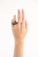Set of SALVÁREA interconnection rings in smoky tones, showcasing versatile jewelry rings for stylish accessorizing.