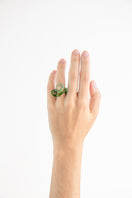 Set of green interconnected rings from SALVÁREA, showcasing the stylish interconnection design in this rings collection.