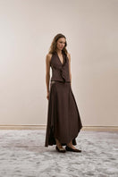 Brown YASSMIN SALEH intersect midi skirt displayed from the front, showcasing its stylish design and flowy fabric.